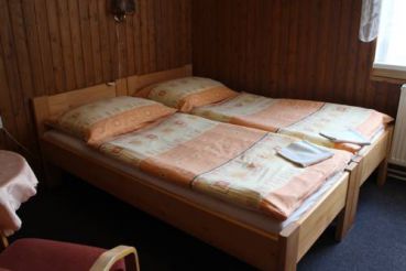 Двухместный номер с 1 кроватью или 2 отдельными кроватями и общим душем